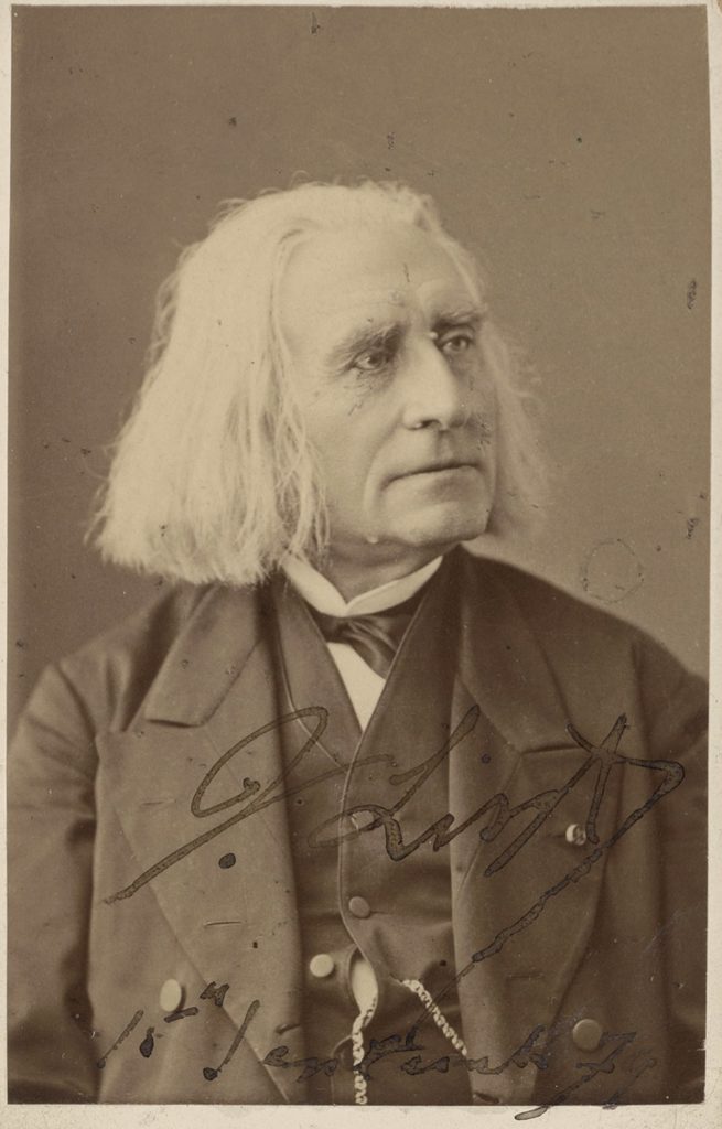 Picture in black and white representing Liszt with a black vest, looking toward his left, smiling. On the picture, Liszt's signature and a date: September 15, 79.