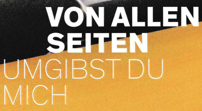 You surround me from all sides, written in white on a black and yellow background, in German